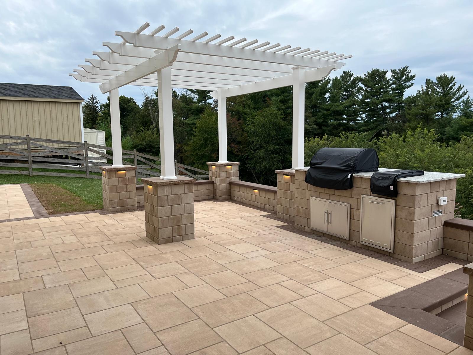 Architectural grade integrated retaining wall and tiered terrace hardscaping