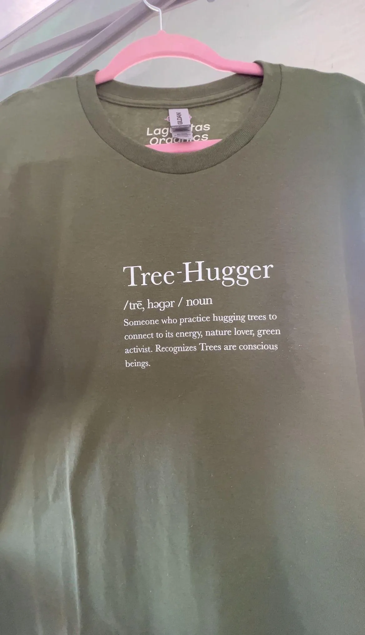 a jar filled with yellow flowers sitting on top of a table