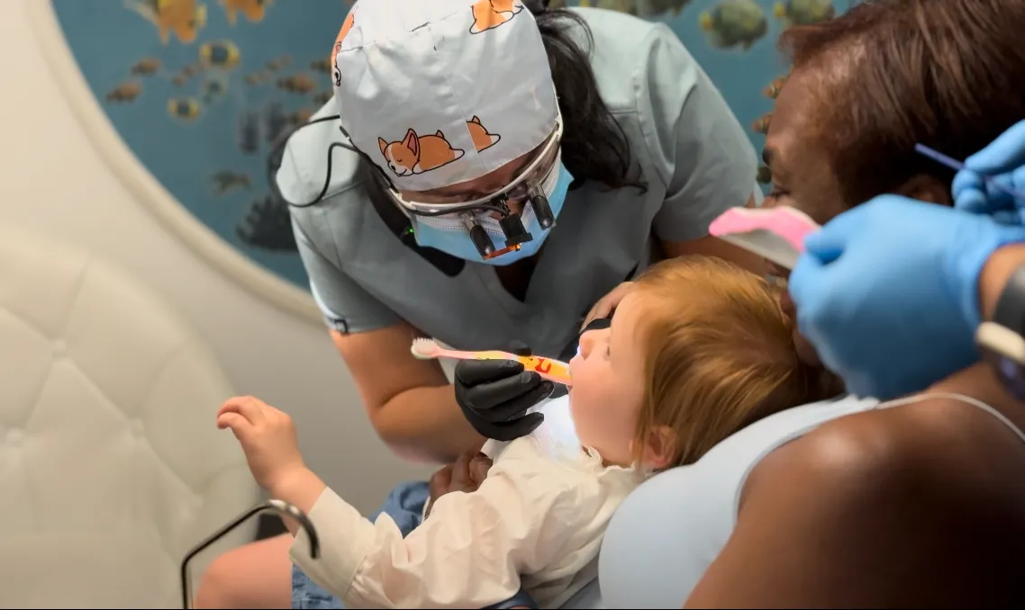 a dentist examining a patient