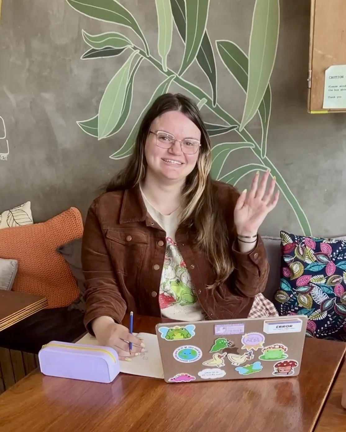 Image of Celeste, owner of Lesty Creates, with a fun illustrated background.