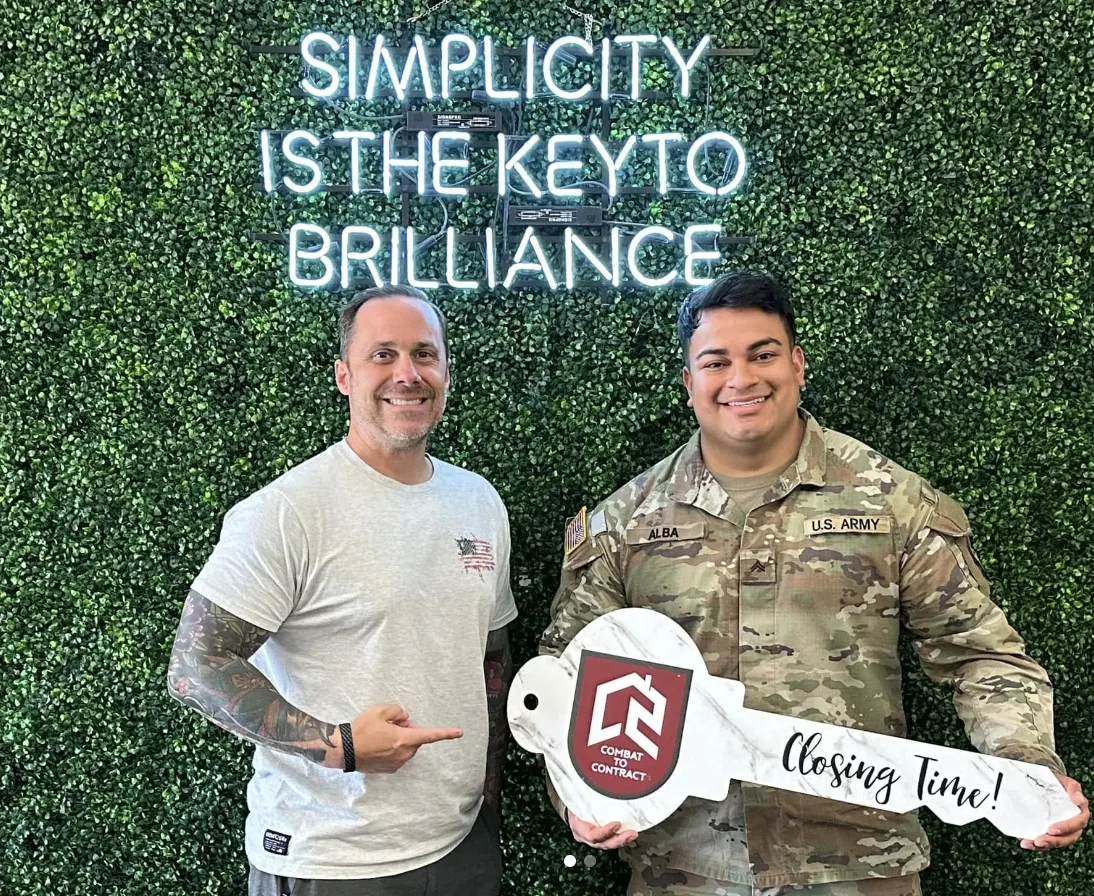 a kitchen with a center island with stools