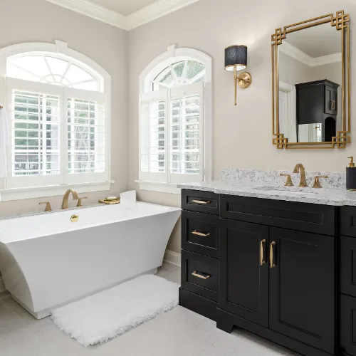 Elegant bathroom featuring luxury fixtures, custom tile work, and a spacious walk-in shower for a spa-like retreat.