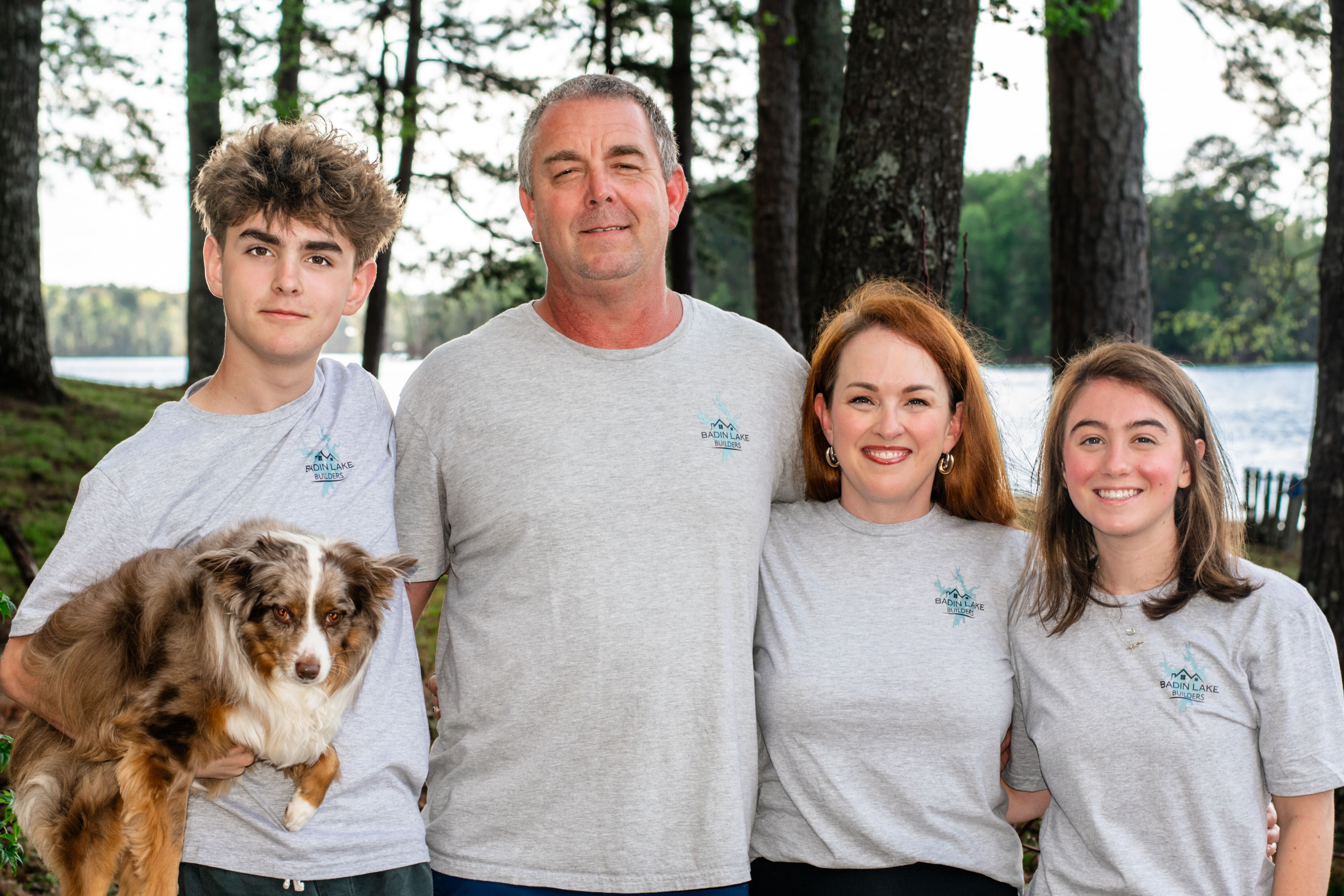 Professional construction team reviewing blueprints on-site, ensuring quality craftsmanship and attention to detail in every project.