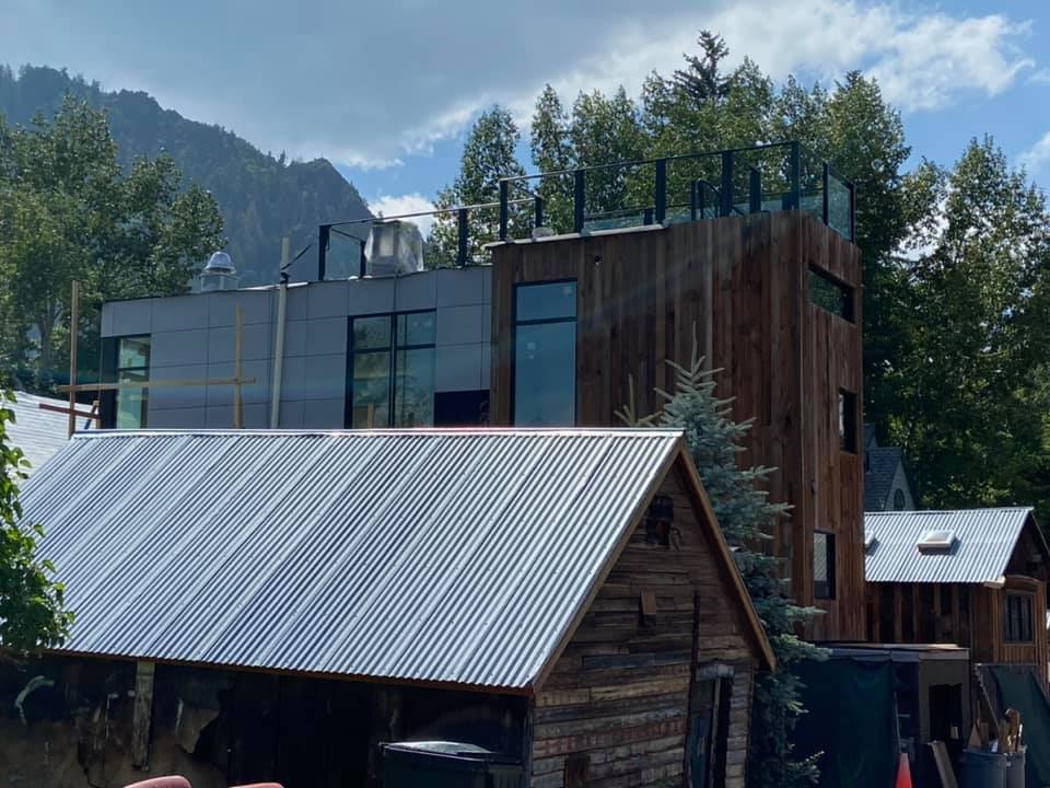 an office with a lot of desks and chairs