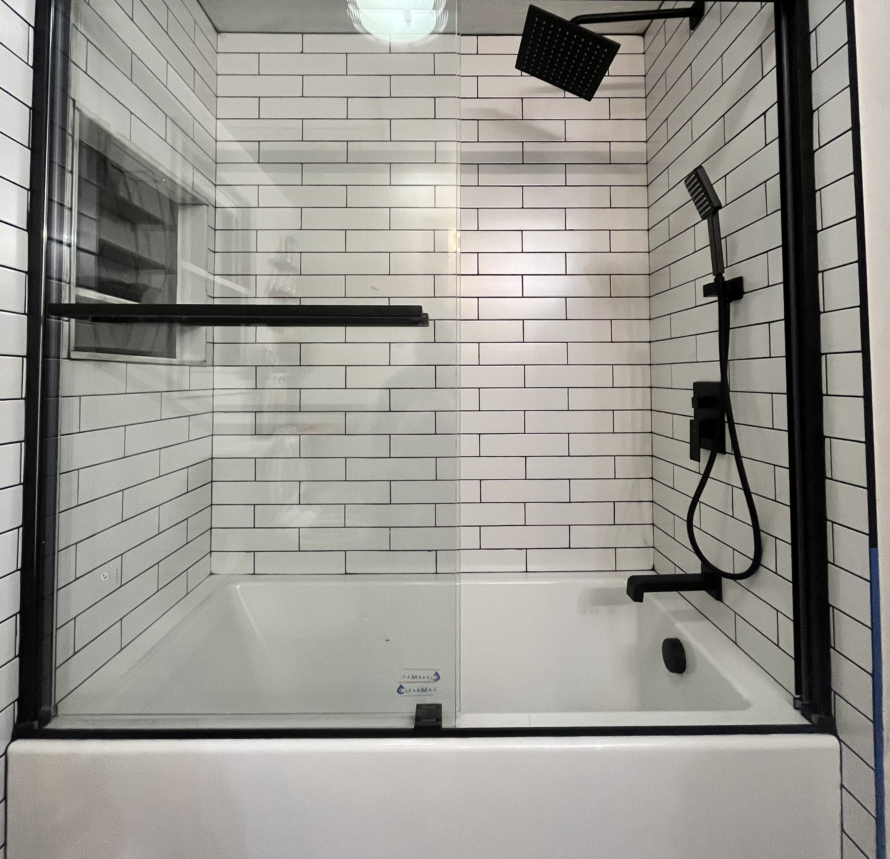 Tile bathtub surround installed by Grams Tile, Inc in Lunenburg, MA