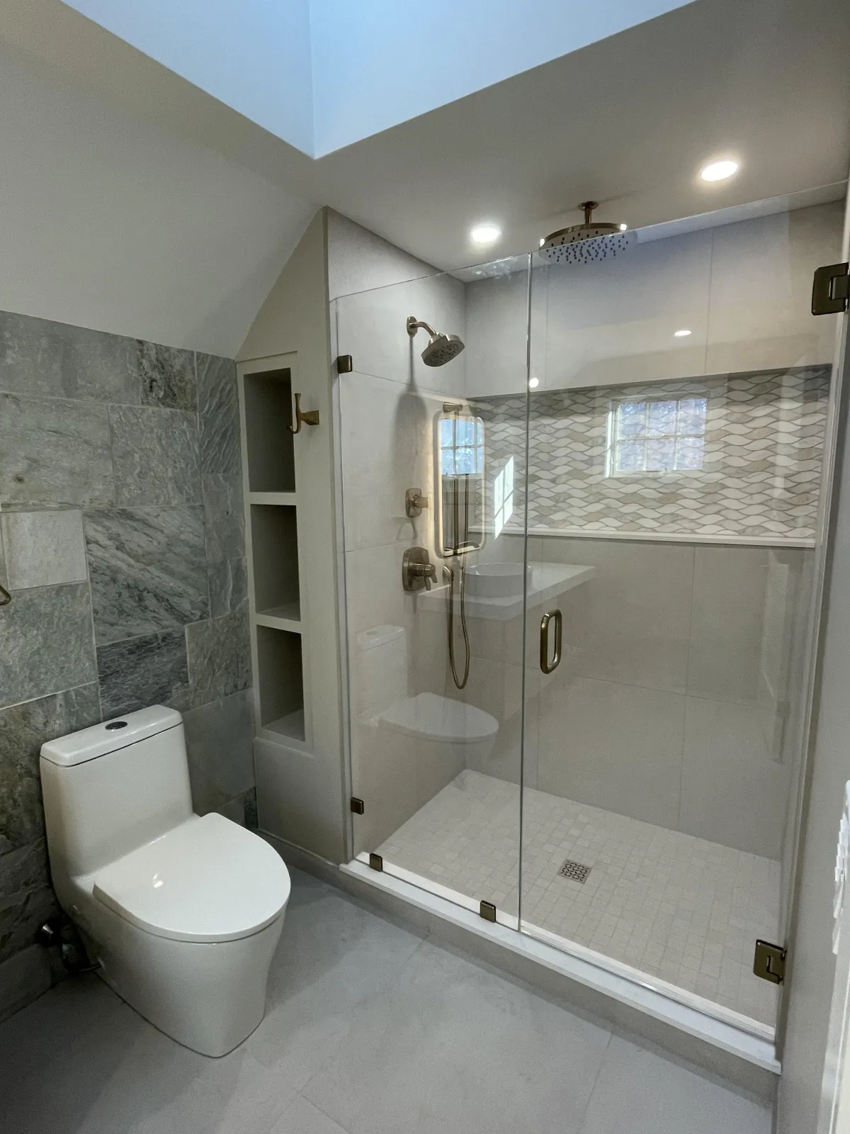 Completed bathroom remodel with custom tile work by Grams Tile in Lunenburg, MA