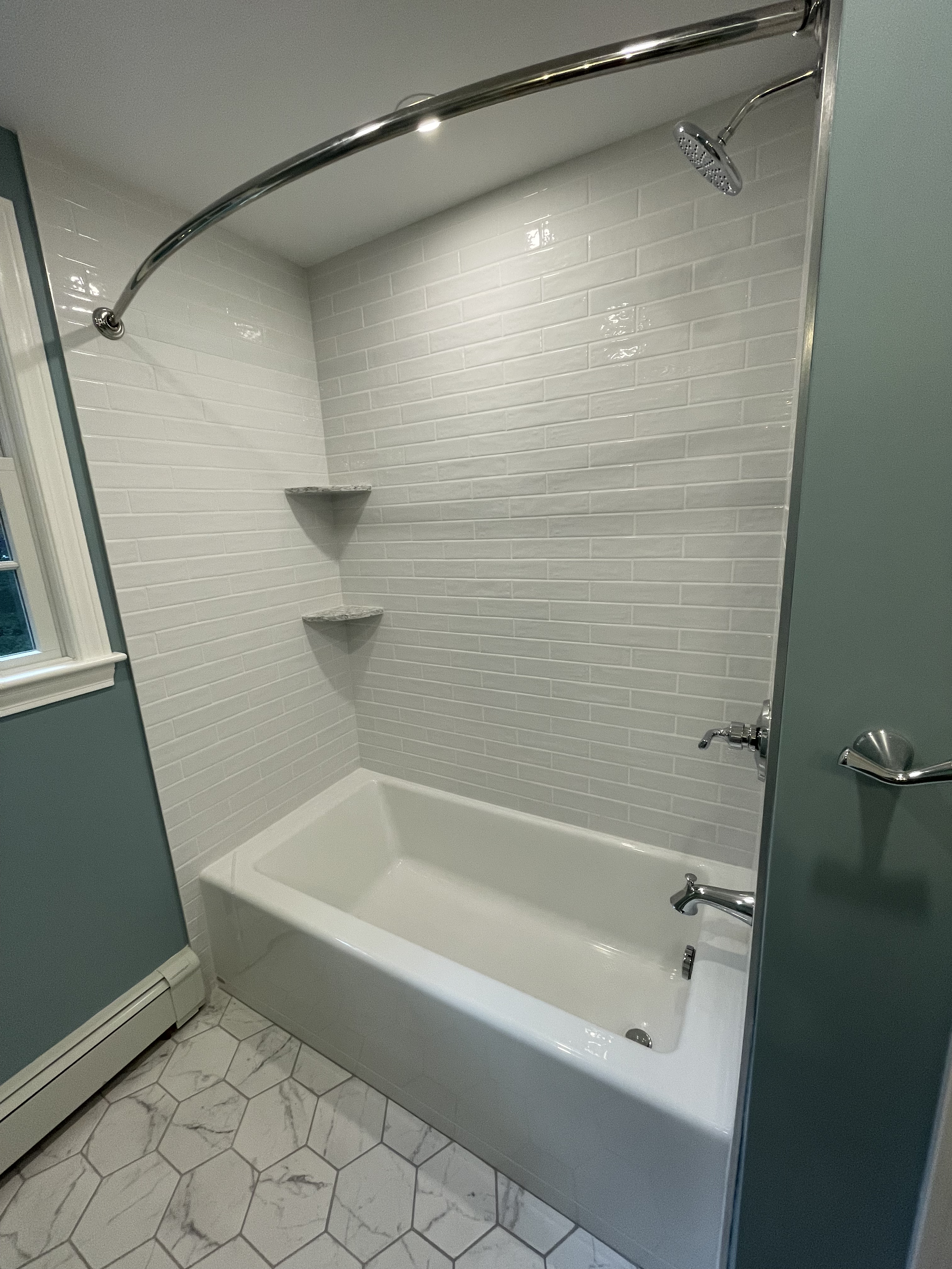 Tile bathtub surround installation by Grams Tile in Lunenburg, MA