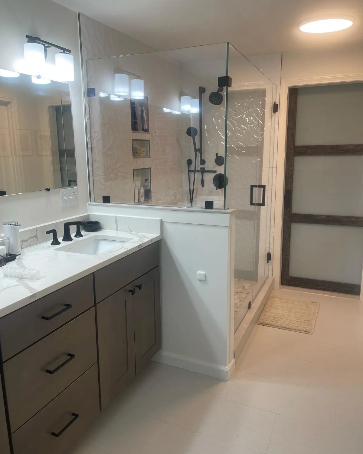 Completed bathroom remodel with custom tile work by Grams Tile in Lunenburg, MA