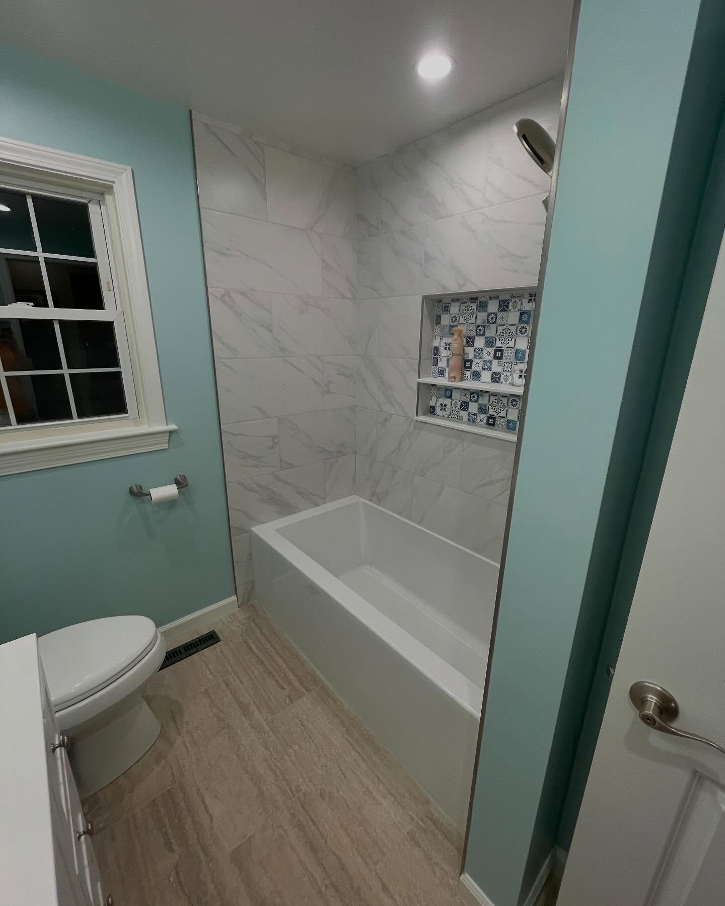 Tile bathtub surround installation by Grams Tile in Lunenburg, MA