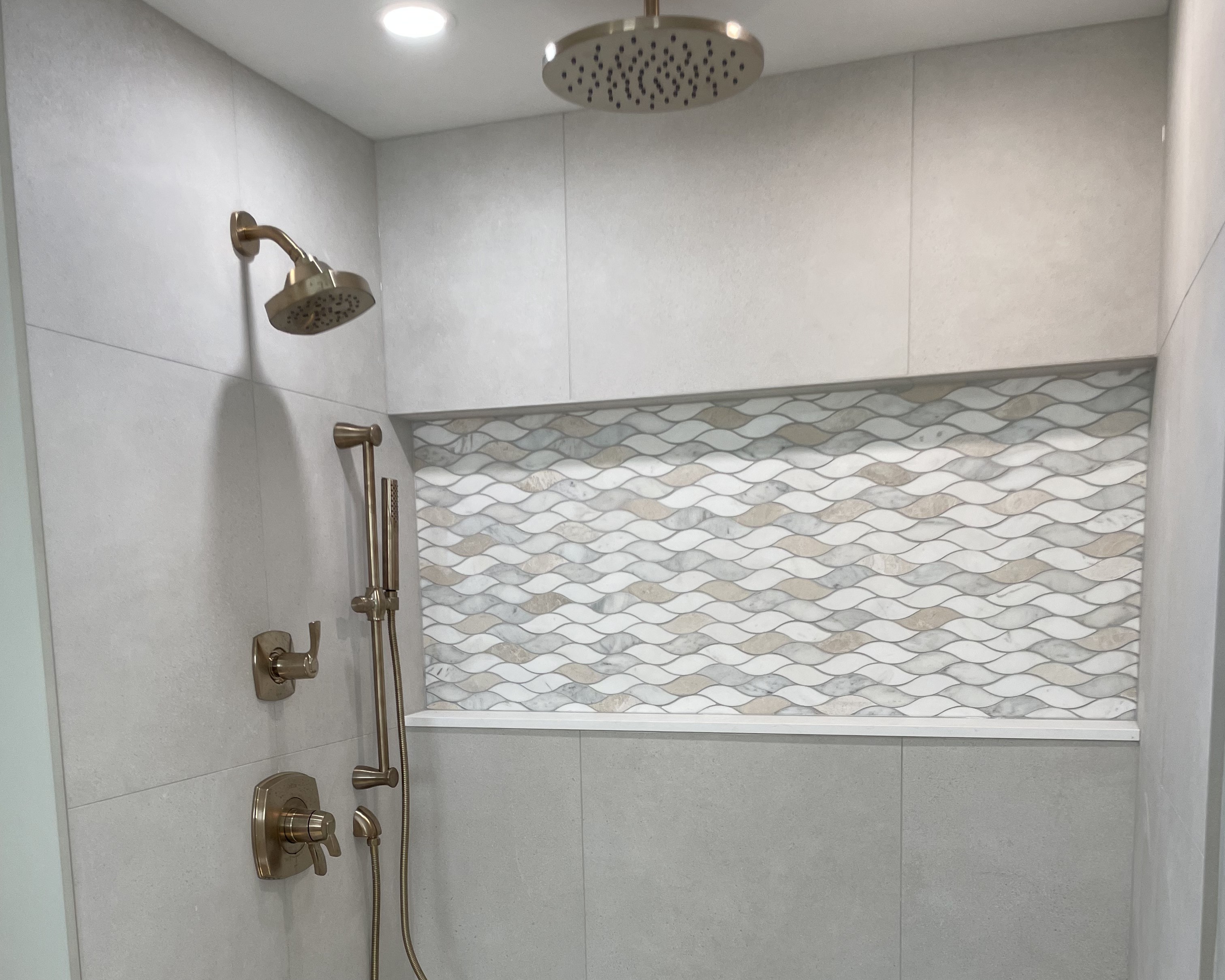 A well designed shower that uses the best tile for each area in Leominster, Massachusetts