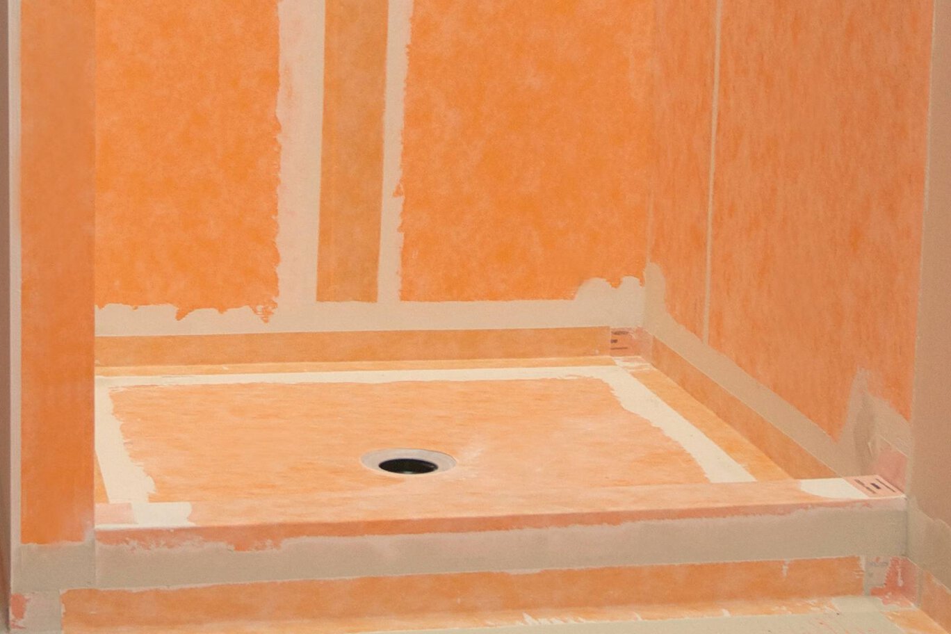A proper waterproofing system underneath the tile in a new shower