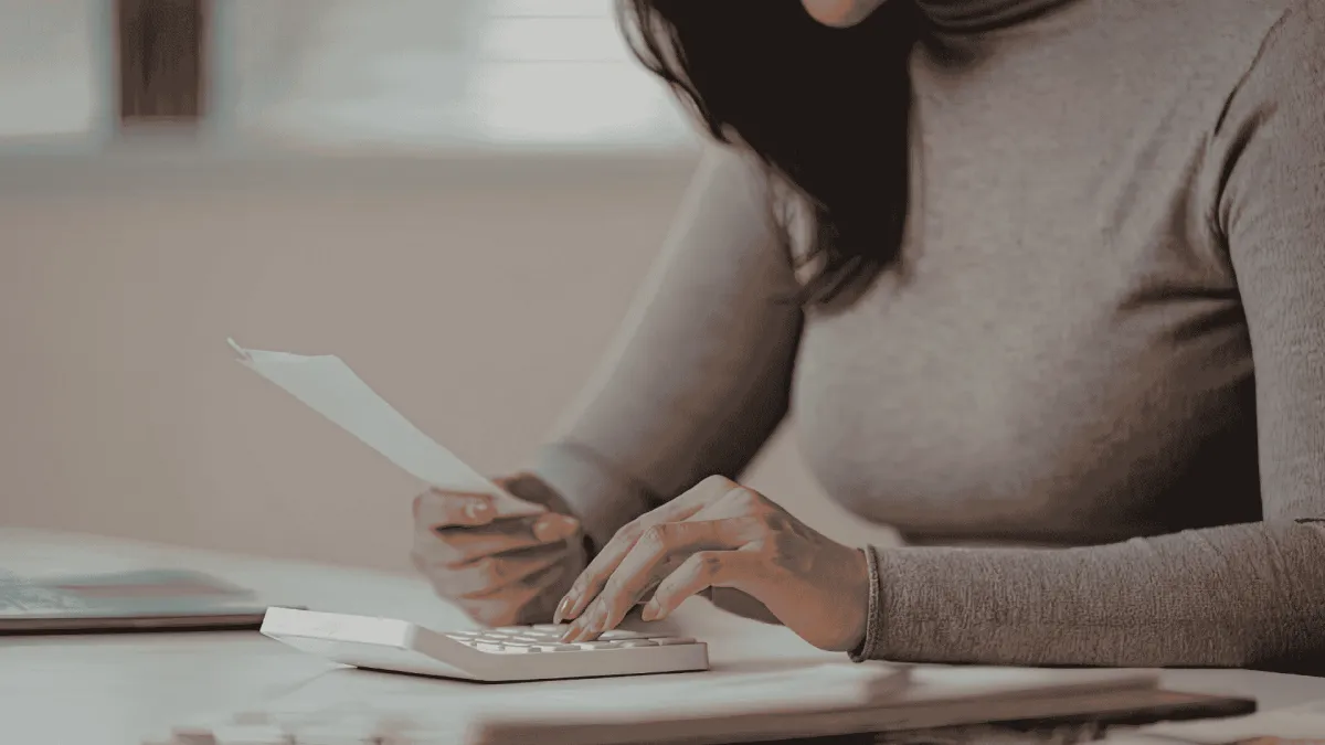 therapist reviewing nonprofit practice funding streams at desk