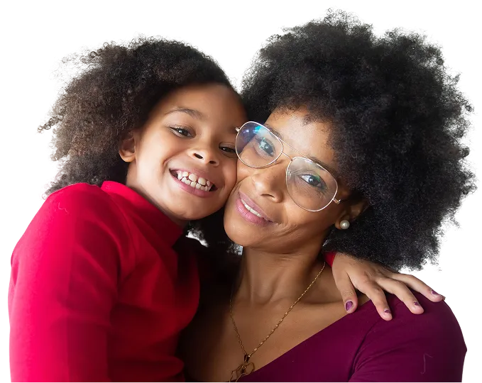 Smiling mother and daughter embracing each other
