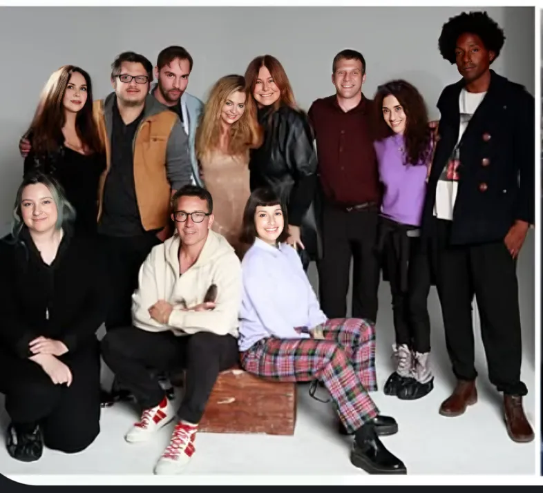 a team photo after the cover was photographed