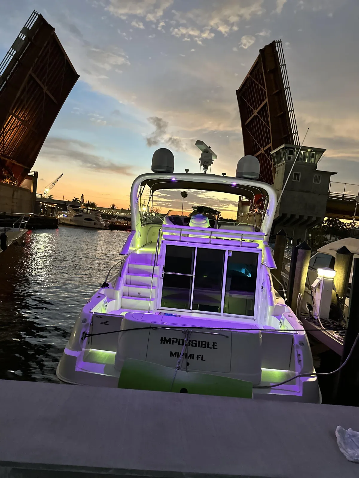 Rear view of one of the yachts of the Elite Sports Yachts in West Palm Beach during the sunset
