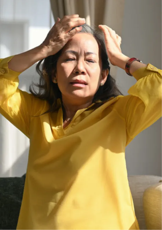 Small-group shot of diverse midlife women (ages 40–70) offering mutual support in a lifestyle/clinical-appropriate setting