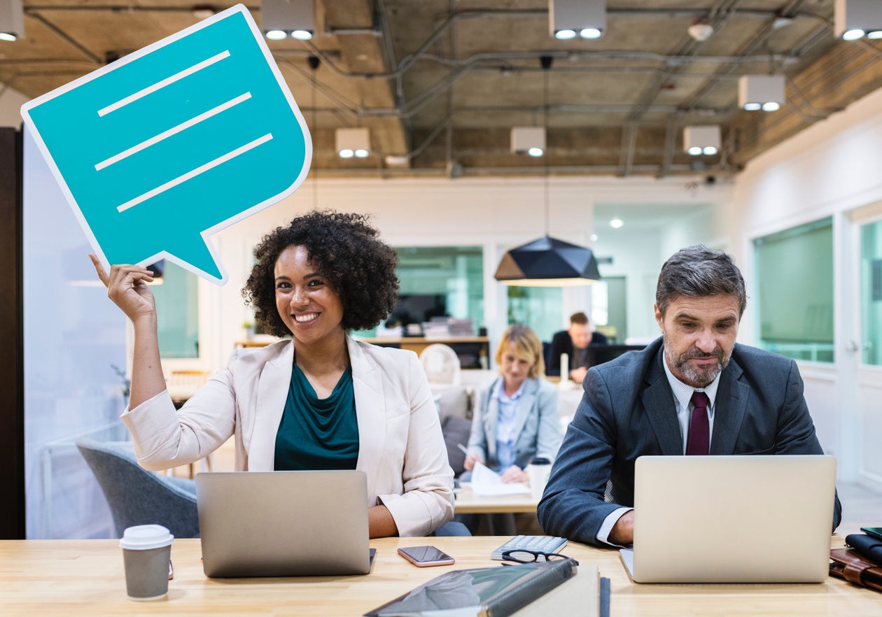 Playful illustration of two Black women collaborating at a bright, welcoming workspace