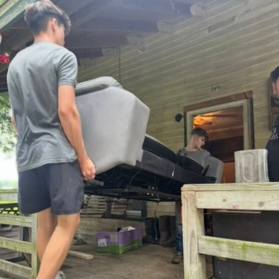 Apartment move with movers carrying furniture