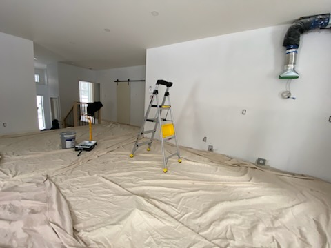 Cuisine résidentielle peinte en OC-45 Café Suisse de Benjamin Moore dans les Laurentides par Peinture Signature M