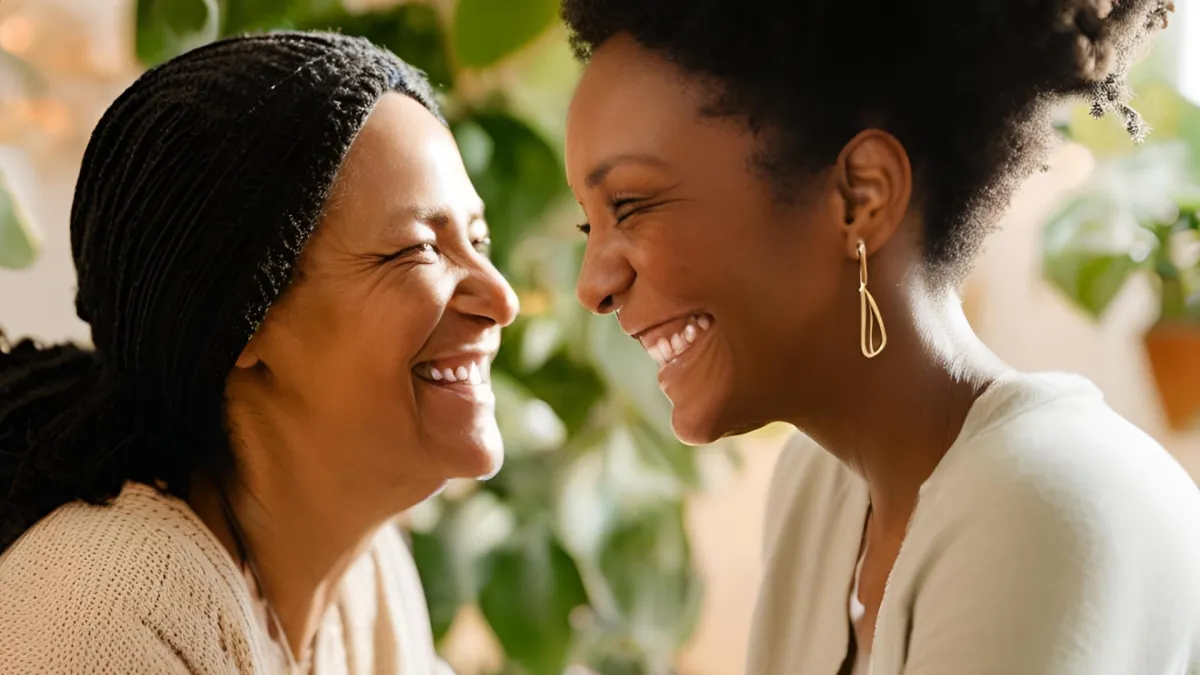 Home care professional speaking with an elderly woman and her family during an in-home consultation, representing NuLook’s personalized and compassionate care planning.