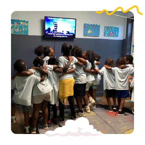 children singing karaoke