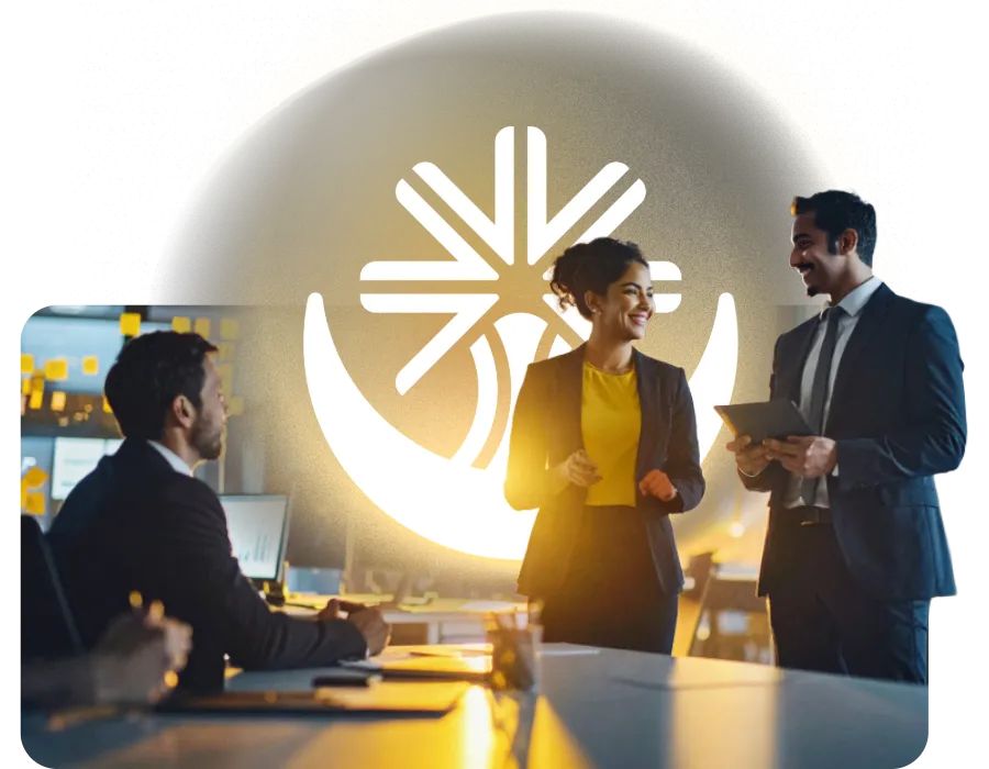 Colaboradores de una empresa interactúan y laboran armoniosamente, mostrando un bienestar corporativo.