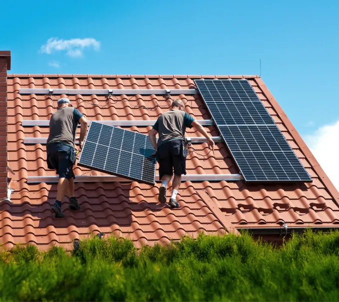 Solar panels being installed on a roof