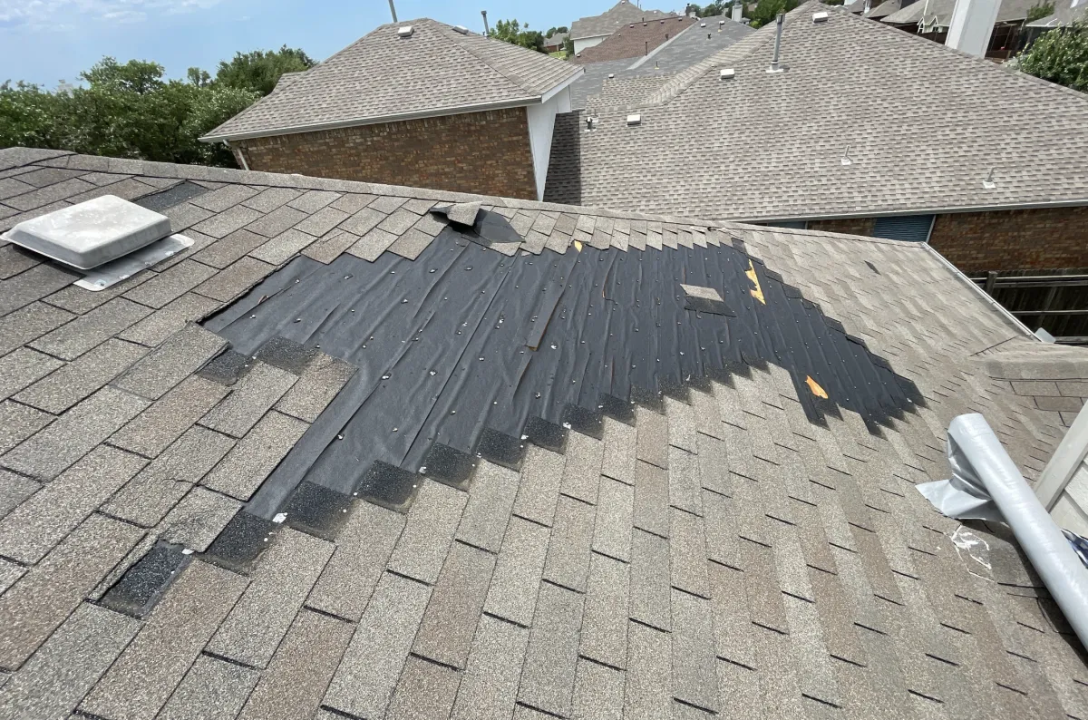 missing shingles due to wind damage 