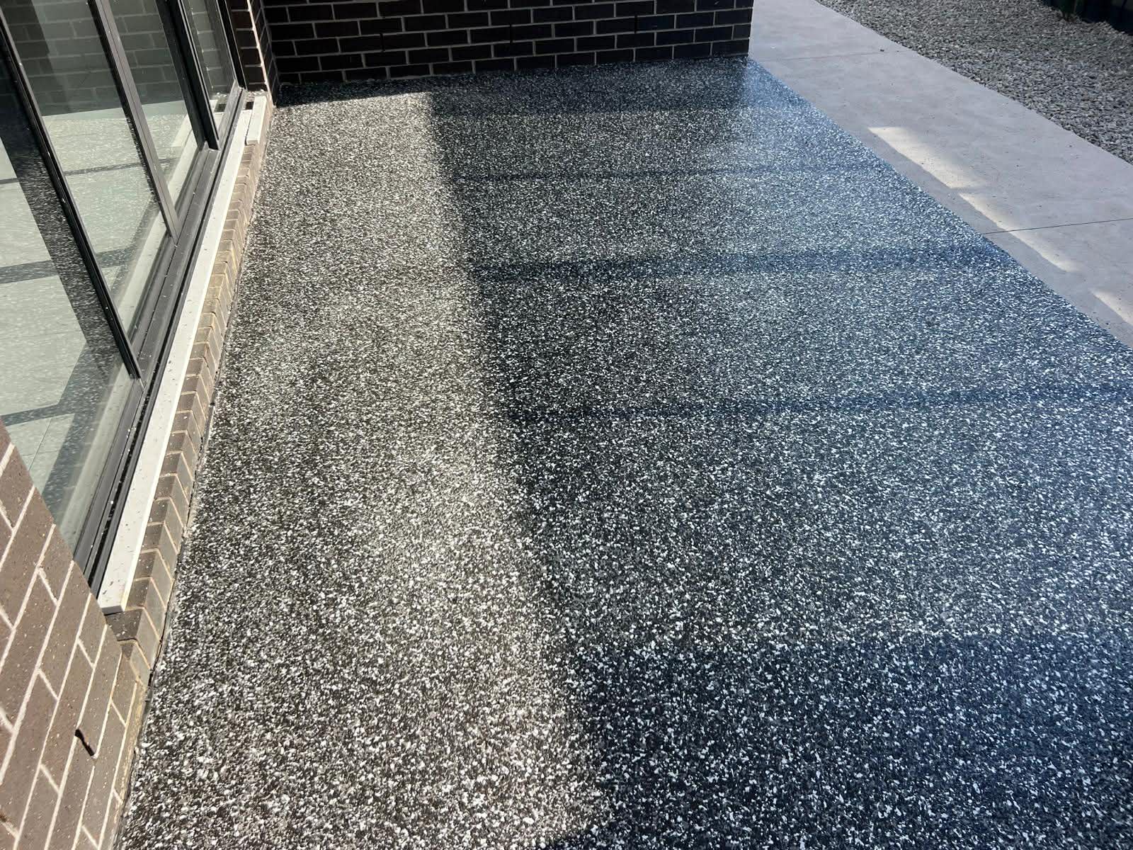 black, white epoxy flake floor in alfresco