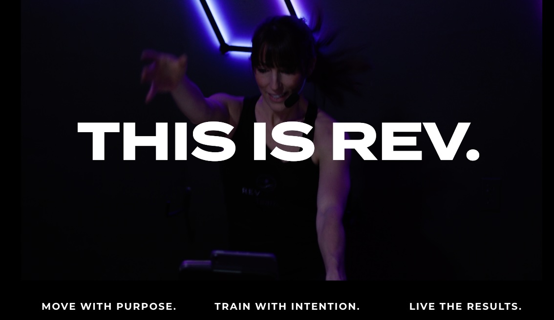 Athlete demonstrating high-level functional movement capacity in a cinematic dark environment