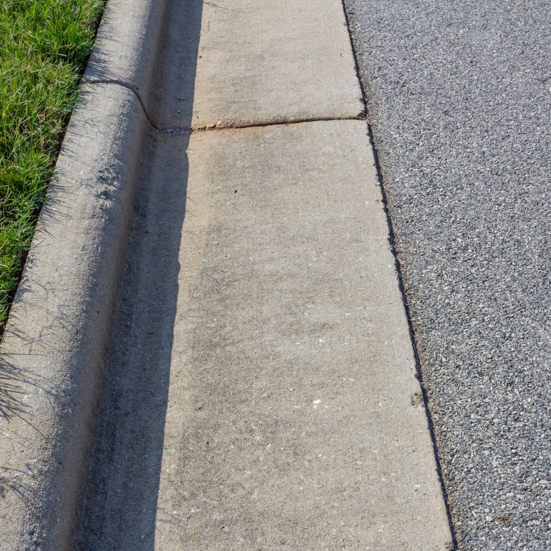 Street curb power washing