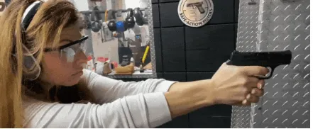 Tiffany Shooting a gun at the Range 