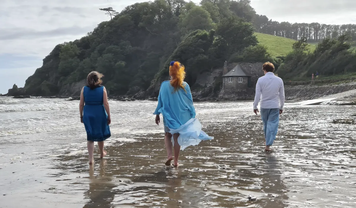 Sally, Sophie and Jerome walking together by the sea