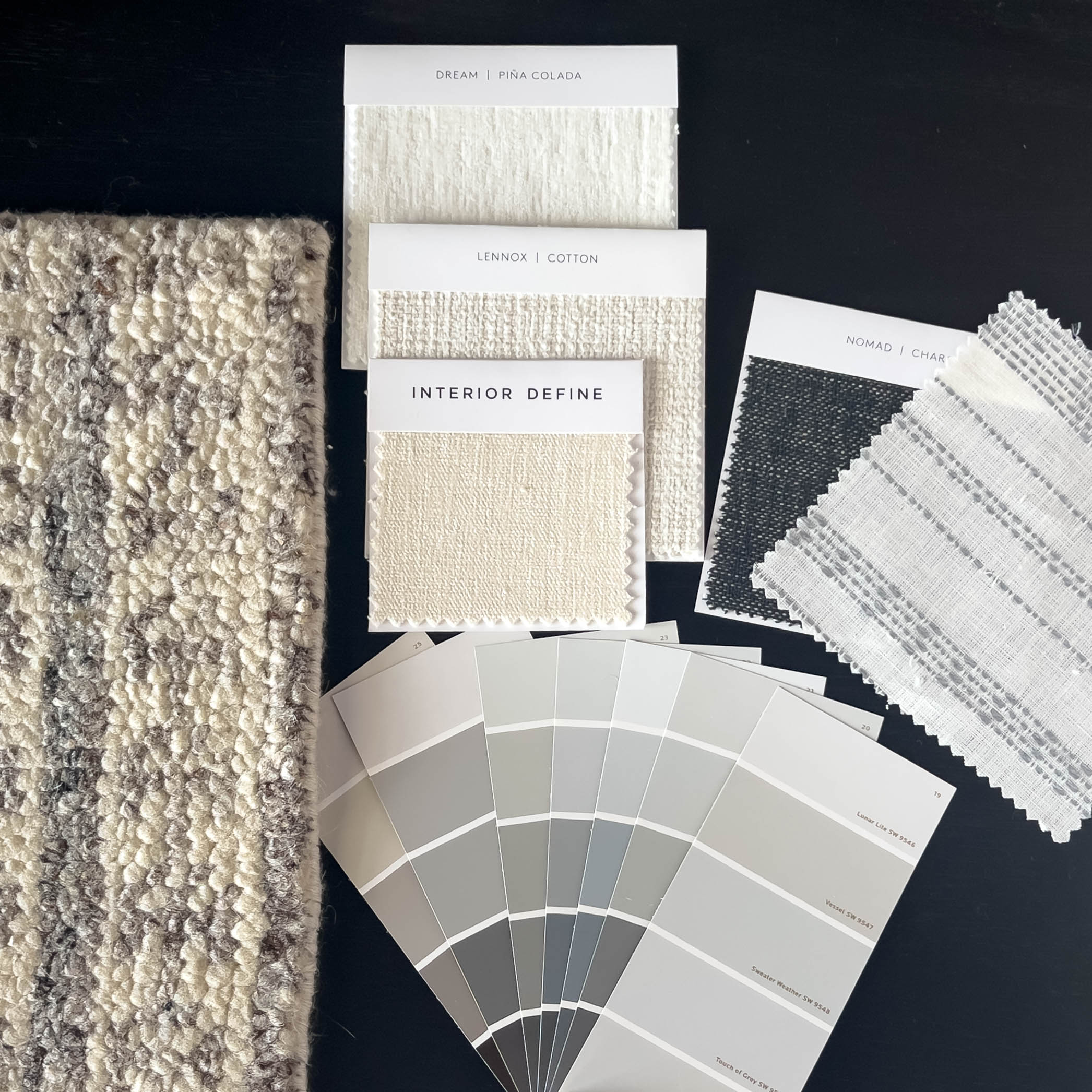 Interior design fabric swatches paint color samples and rug displayed by Jessica James Interiors Franklin Tennessee