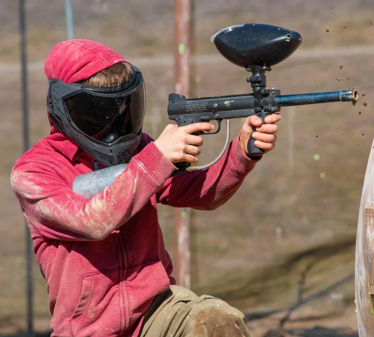 Beginner‑friendly outdoor paintball field with pallet bunkers at Bear Ridge Paintball, Jasper GA