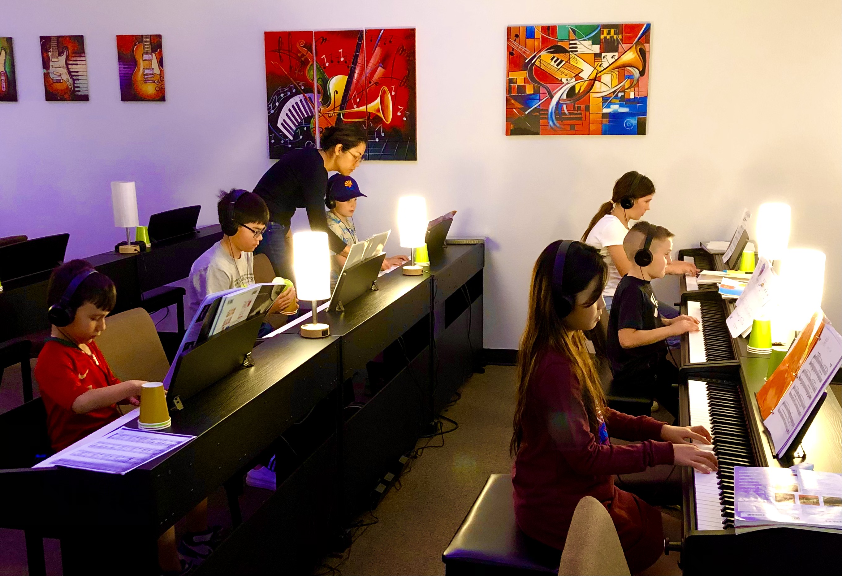 Friends enjoying a picnic and music in the park