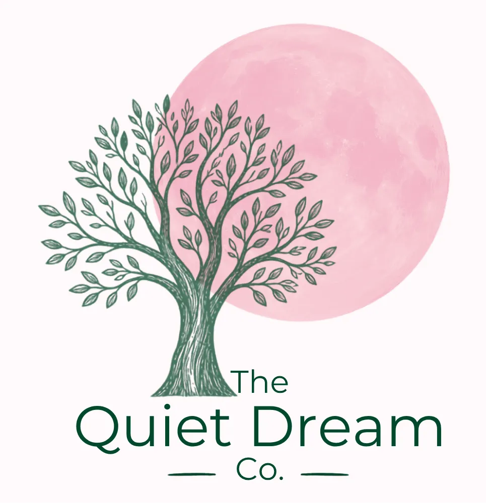Logo. Greentree with pink moon behind it. At the bottom, The Quiet Dream Co.