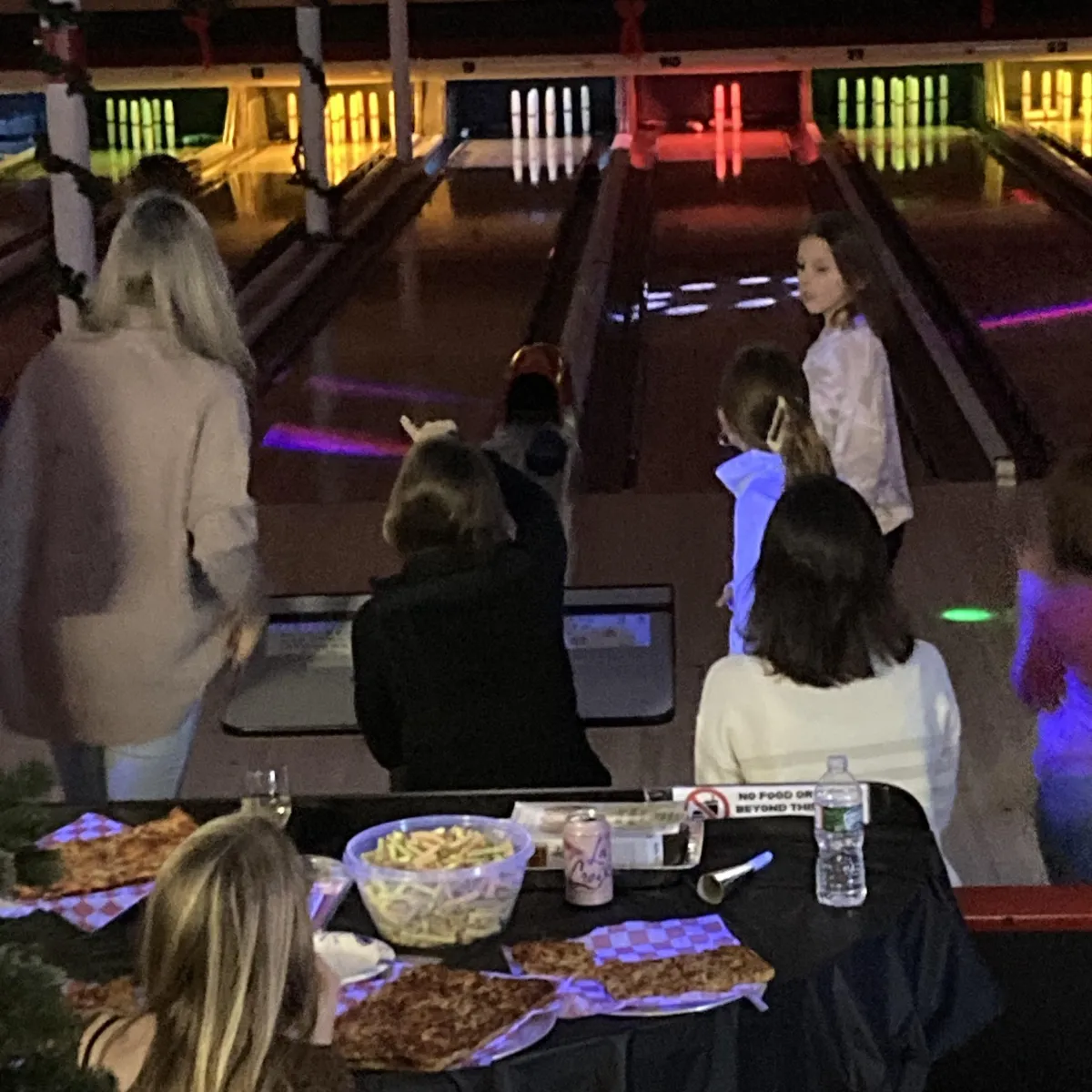 Family Candlepin Cosmic Bowling Party