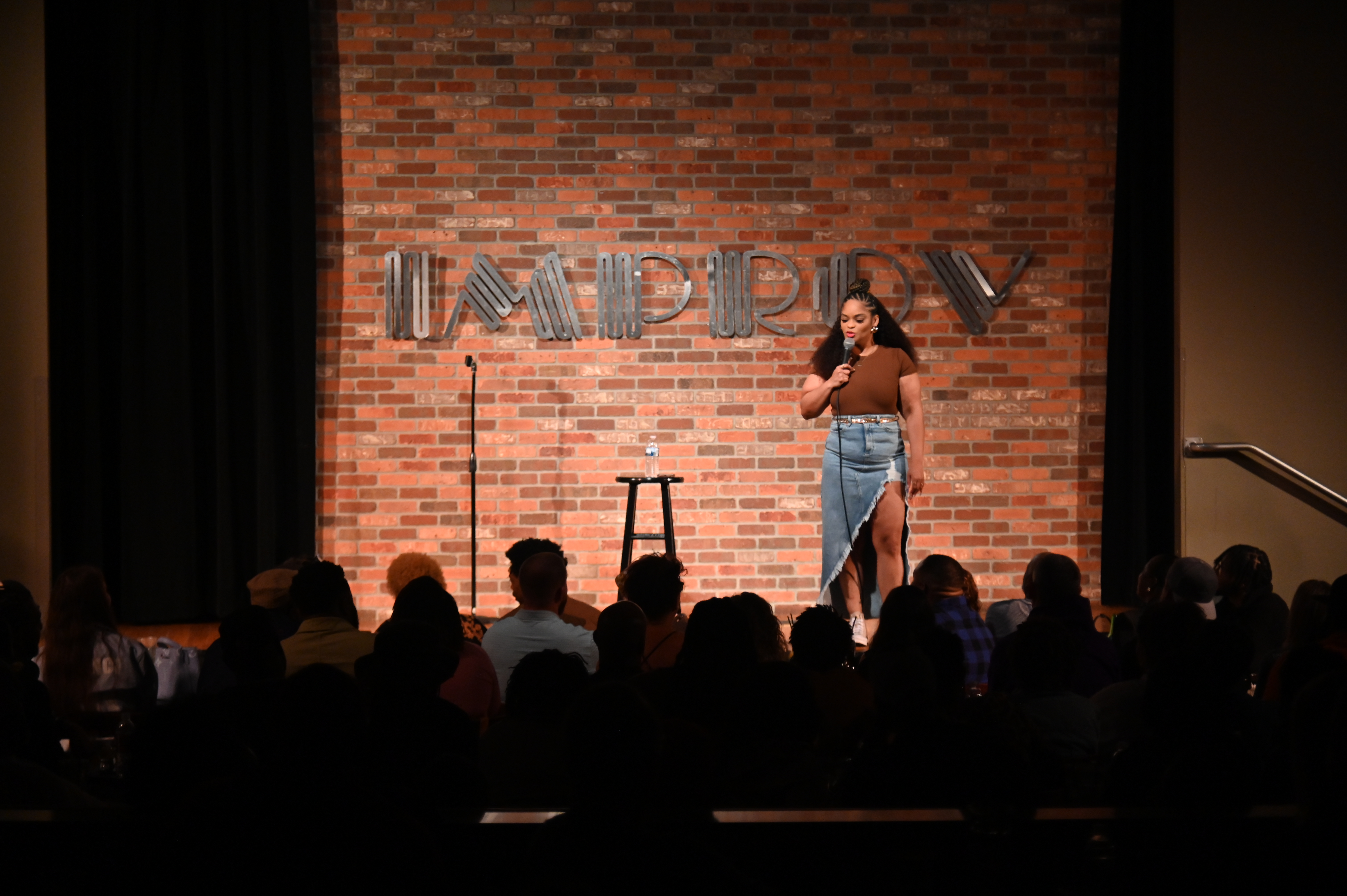 Comedian Lotto Marie Performing at the improv