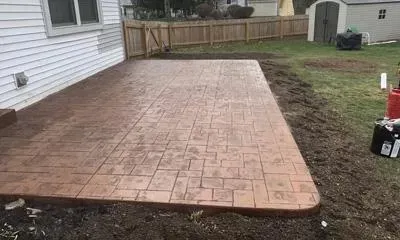 Decorative concrete installed by CR Concrete Construction showcasing a unique concrete style for a back patio