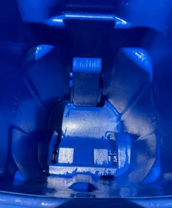 Inside view of trash bin cleaning system with high-pressure washing equipment