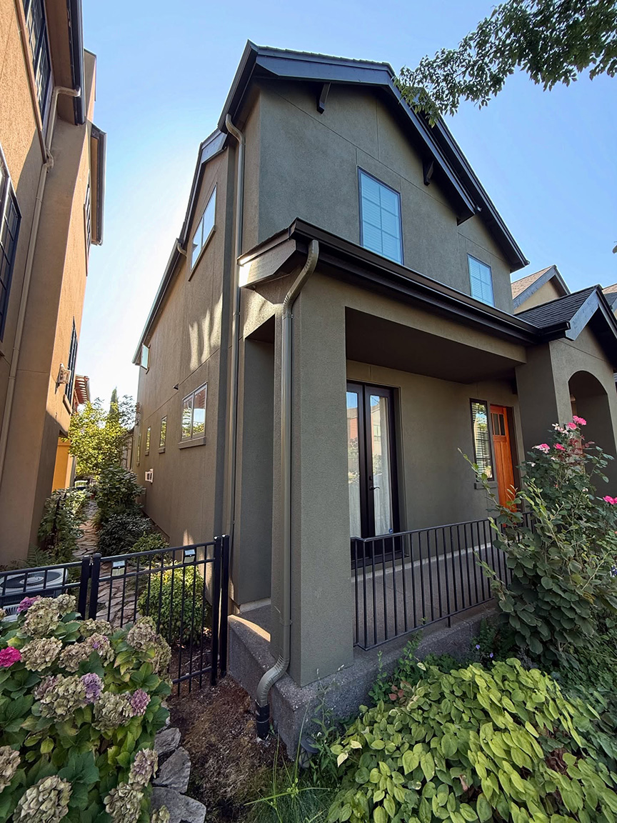 Arlington house painting crew finishing a high-end exterior
