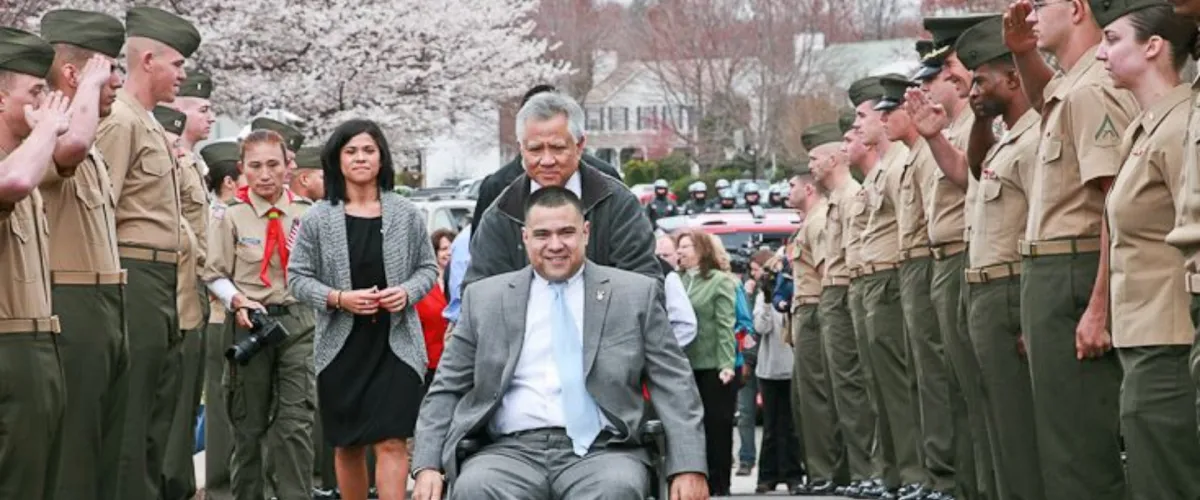 Handicapped veteran being welcomed to his new house