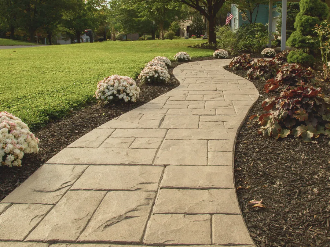 Stamped concrete walkway installed by Askew & Sons in Dawsonville, GA – custom design with stone texture