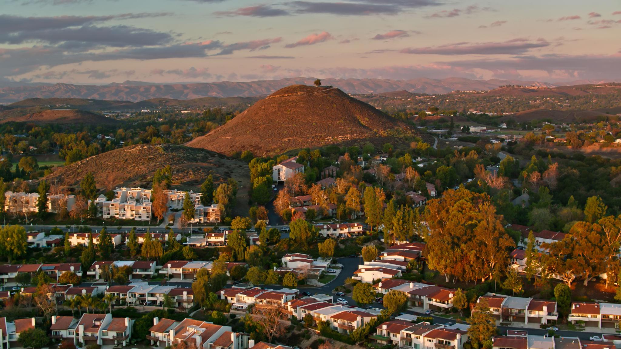 Beautiful residential neighborhood in Thousand Oaks with mature trees and mountain views.