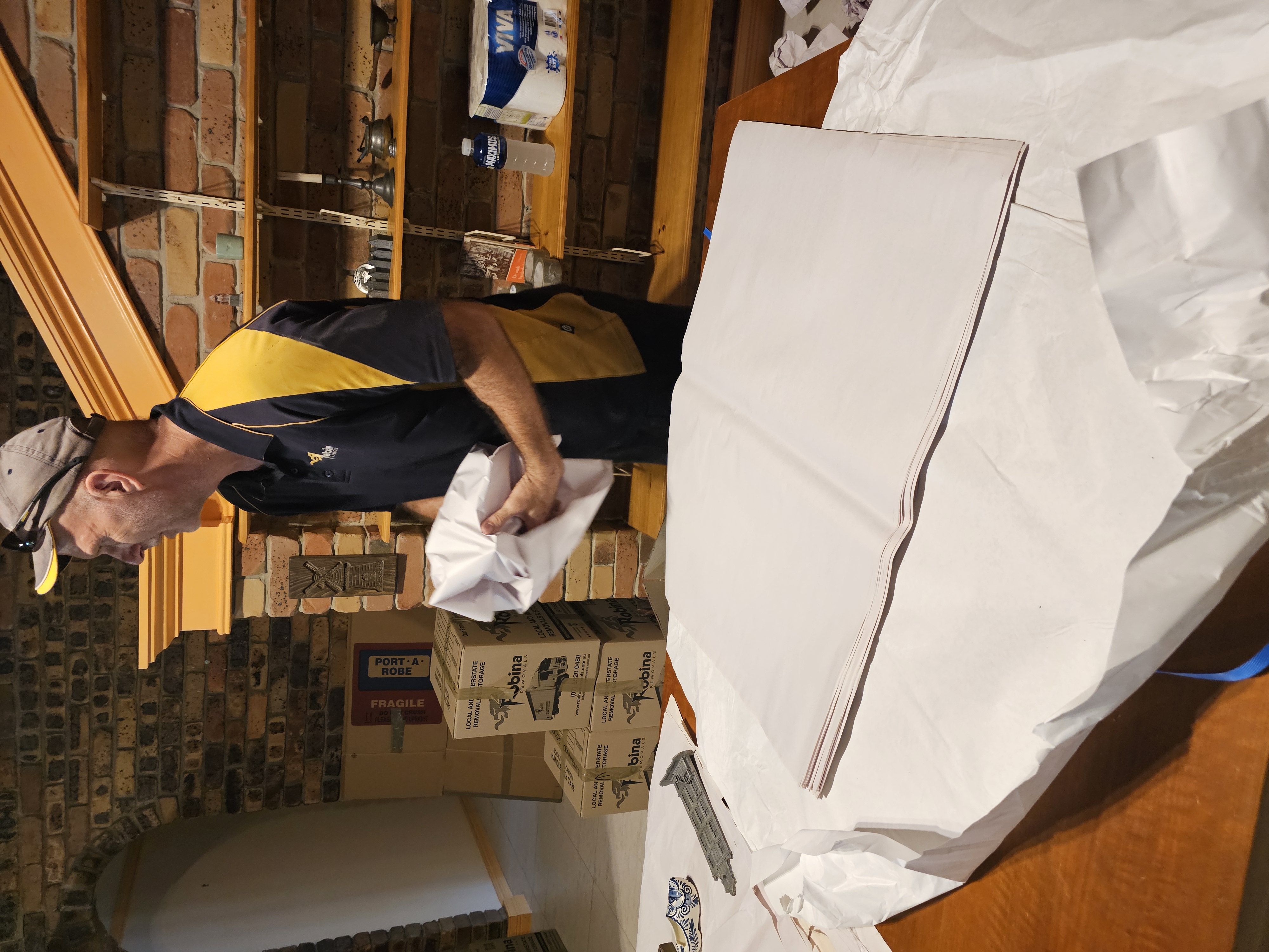 a man is unloading boxes from a van