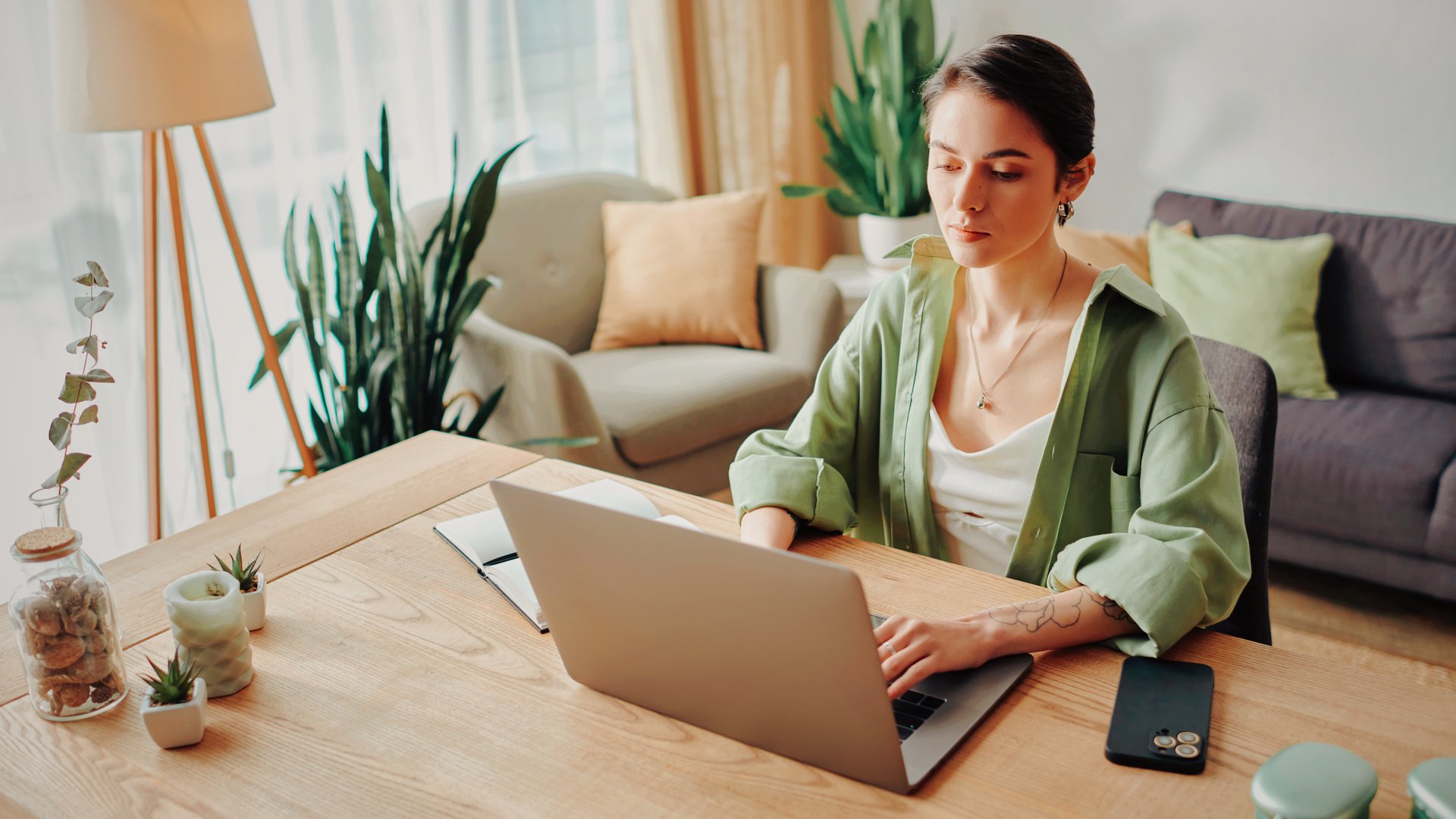 Website owner carefully checking her rankings while switching platforms, making sure her SEO stays intact.