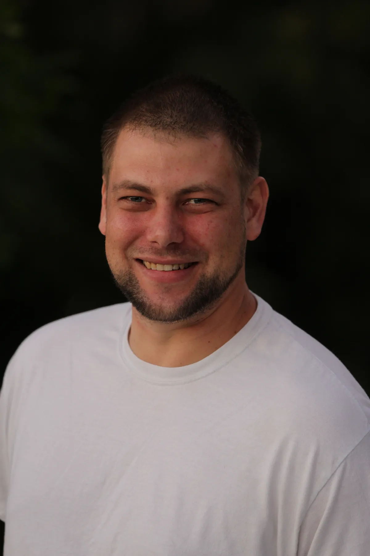 Kyle Hedin — founder of Illustrious Flooring installing hardwood floors in Waukesha, WI