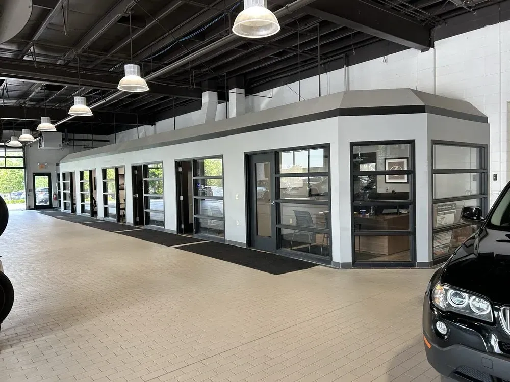 Spacious Milwaukee living room featuring warm painted walls, modern furniture, natural light, and city views.