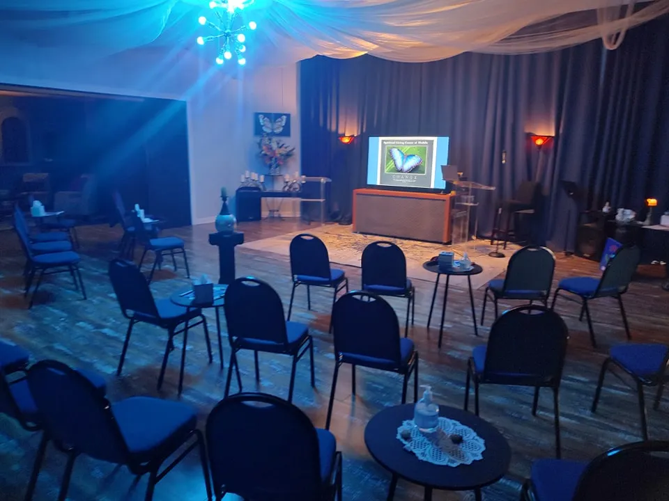 Event hall with stage area and setup for a service